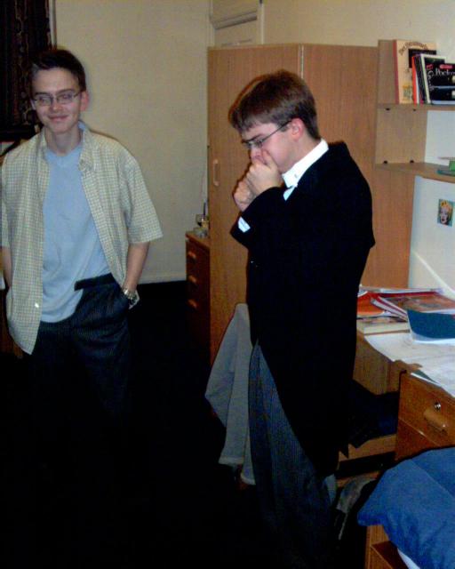 Eddy and Oli, at school, changing after an Abbey service